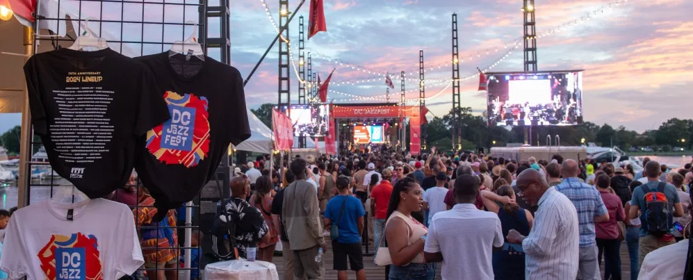 Crowds attend a vibrant jazz festival on the Wharf in Washington, DC.